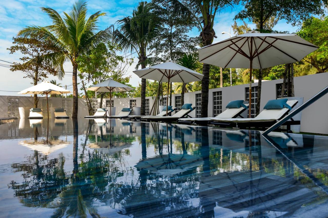 The Blossom Hoi An Ocean Front Hotel & Spa Экстерьер фото